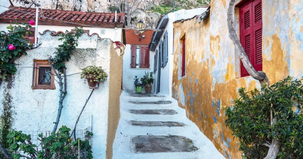 Stone homes in Greece with red-tiled roofs