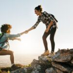 Two US expats on a hike discussing Form 1116 Instructions.